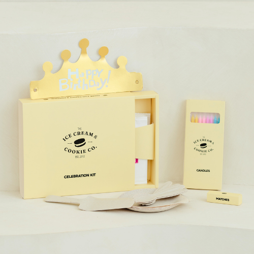 Celebration Kit complimentary with every cake — plates, utensils, knife, candles, matches, Happy Birthday tag
